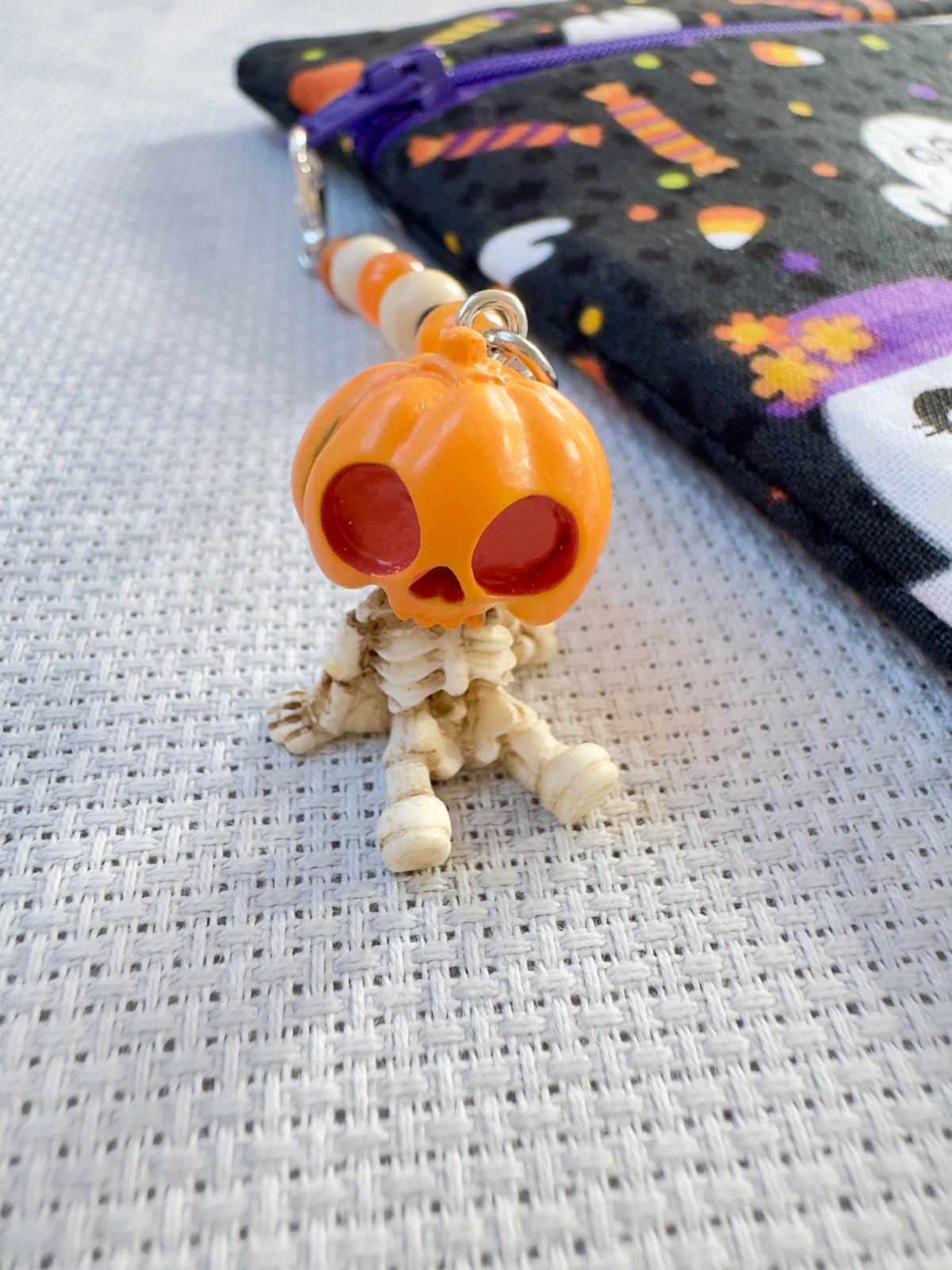 Pumpkin Sitting Skeleton Project Bag Zip Charm