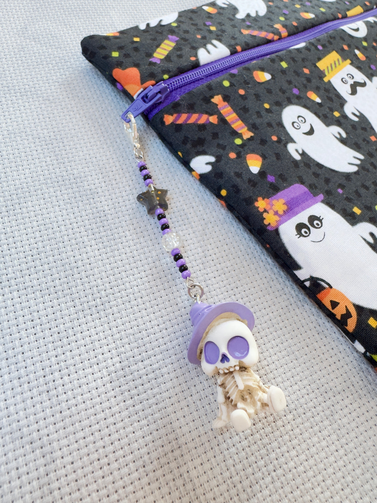 Sitting Skeleton with Hat Bag Zip Charm