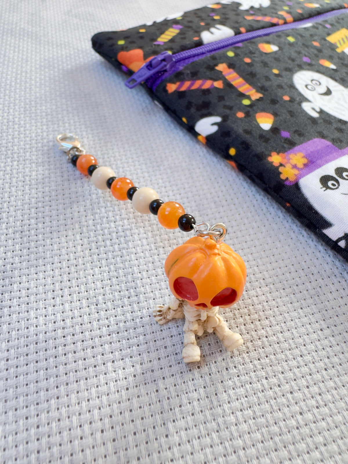 Pumpkin Sitting Skeleton Project Bag Zip Charm
